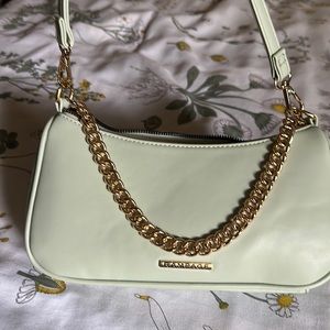 RAMPAGE Light green shoulder purse with gold accents